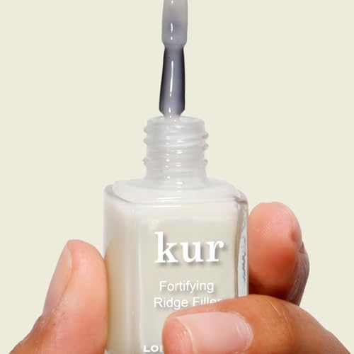 Close up of the product label showing paraben free and fortifying nail treatment specifications