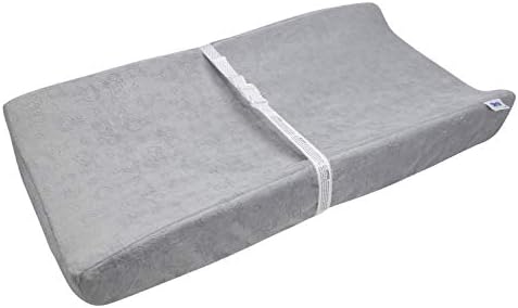 Serta Perfect Sleeper baby changing mattress placed on a standard nursery dresser table.