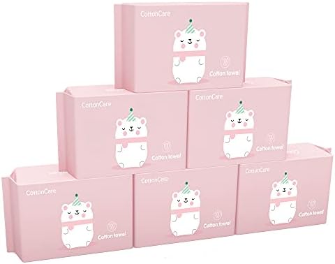 Infant face cleaning with Cottoncare hypoallergenic wipe