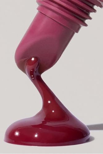 Rhode tinted lip balm Raspberry Jelly product squeeze tube displayed on a neutral background.