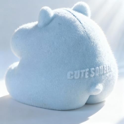 Top angle view of the blue flocked realistic hamster toy on a clean desk background.