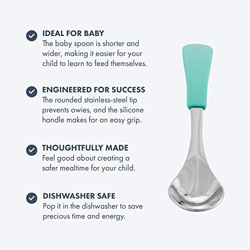 Baby holding Avanchy silicone and steel training spoon