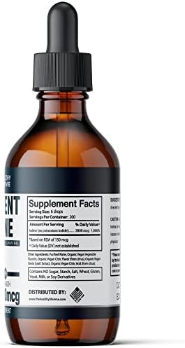 The Healthy Life 4 Me Nascent Iodine bottle with glass of water for usage