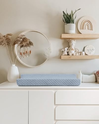 Babebay changing pad cover set being used in a beautifully decorated modern baby nursery