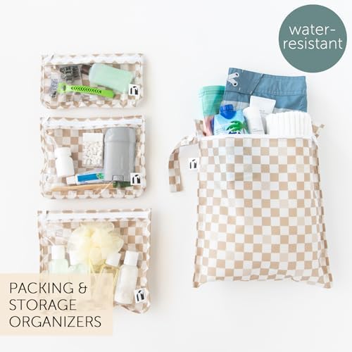 Bumkins waterproof wet bag being used to store baby cloth diapers