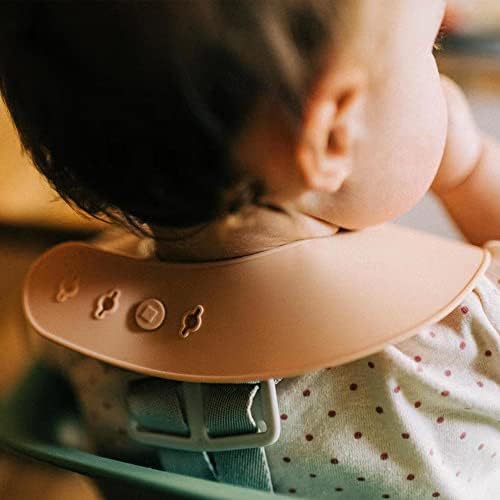 Moonkie silicone baby bibs in cream buck and olive green displayed on clean surface