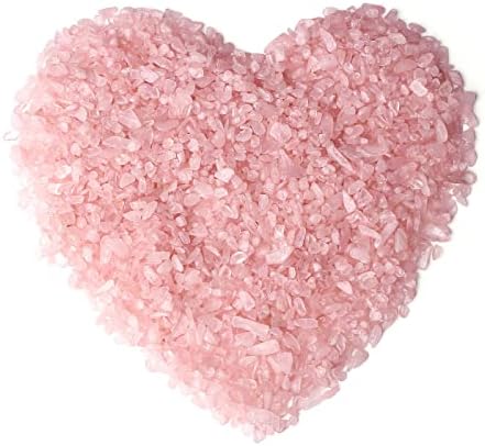 Close up of polished natural Rose Quartz crystal chips.