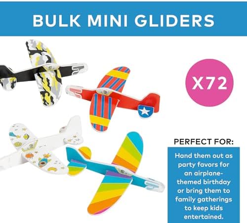 Durable and soft miniature foam glider planes scattered for school classroom rewards and carnival prizes.