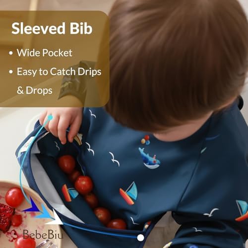 Side angle of the BebeBiu baby smock bib demonstrating full sleeve coverage on a toddler during baby-led weaning.