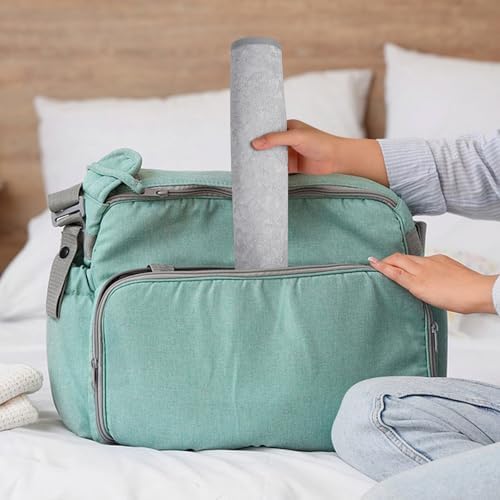 Portable changing pad liners being used in a diaper bag setting