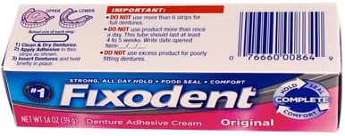 Denture adhesive cream tube showing nozzle tip for precise application