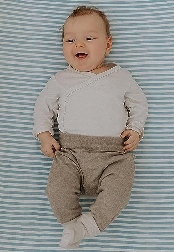 Sorrel + Fern watercolor airplane changing pad sheet fitted on a nursery mattress