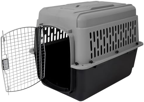 Petmate Aspen Pet travel crate side view displaying the grey plastic top hull and black base with side ventilation slots