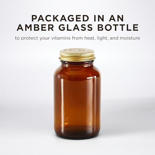 Close up view of Solgar premium gold standard vitamin D3 amber glass bottle base and seals