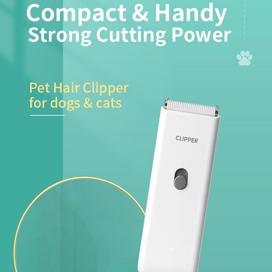 Favrison quiet dog and cat trimmer showing waterproof body being rinsed under tap water