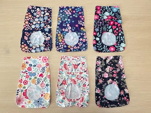 Full set of fourteen Mumufy washable ostomy care wraps neatly organized.