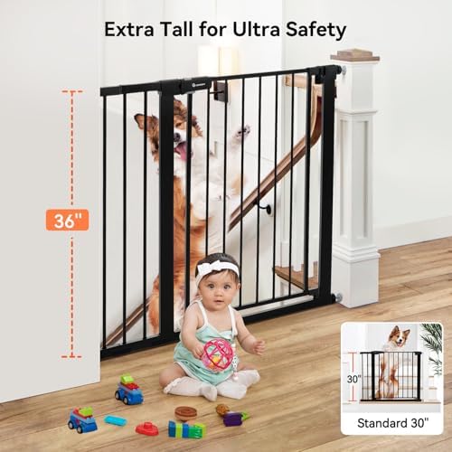 Comomy auto close black dog gate showing the wide walk through door panel open.