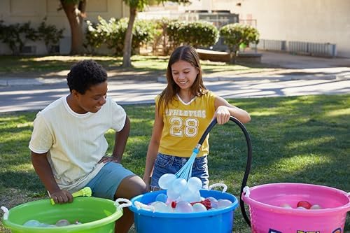 A pile of three hundred and fifty filled multi-colored self-tying water balloons ready for a splash game.
