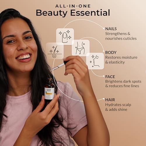 Everyday Beauty imported USA vitamin E oil glass bottle showing the rich amber liquid texture