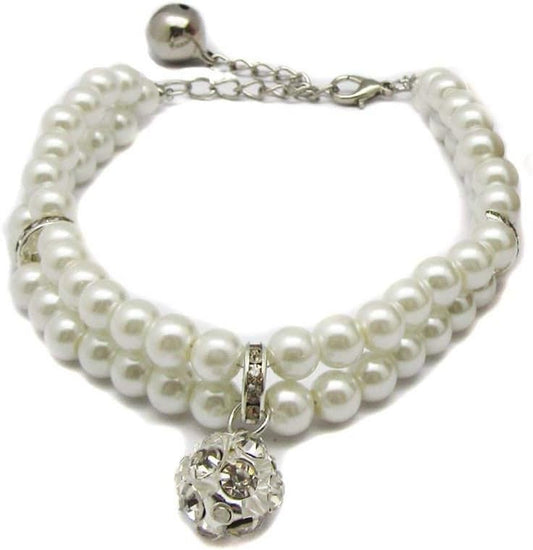 Close up of Petfavorites crystal ball charm and rhinestones