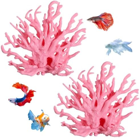 Two pieces of pink fake aquarium corals arranged together on gravel substrate
