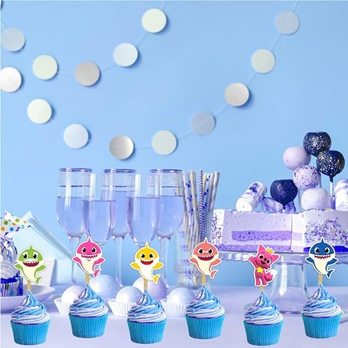 Assembled Baby Shark party decorations on cupcakes
