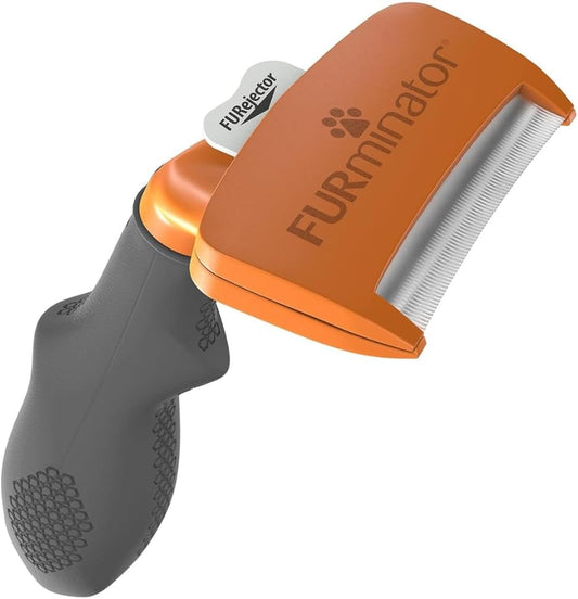 Authentic FURminator medium dog grooming brush with ergonomic handle displayed on a clean background