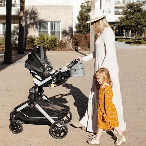 Nanobebe baby bottle travel bag attached to a stroller