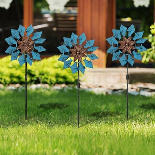 Three Aoutrow wind spinners arranged in a lawn display