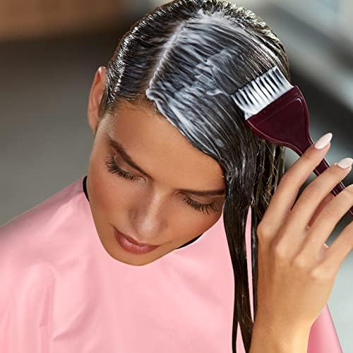 Full length display of 47 inch by 59 inch haircutting cape
