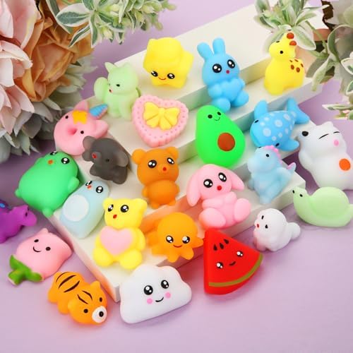 Assorted collection of imported kids treasure box prizes on a clean background