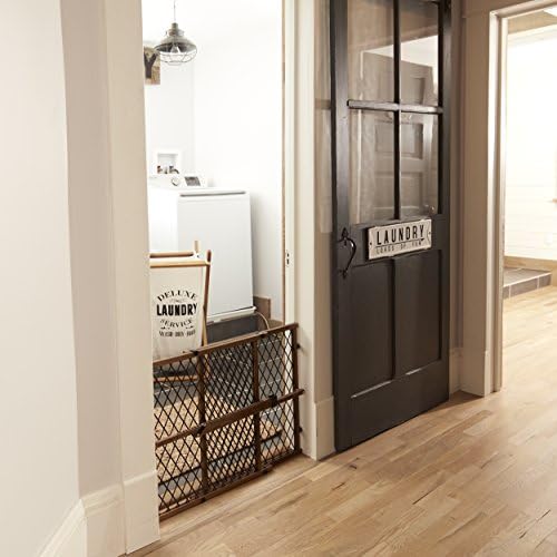 Evenflo safety gate packaging showing authentic imported product specifications for home use.