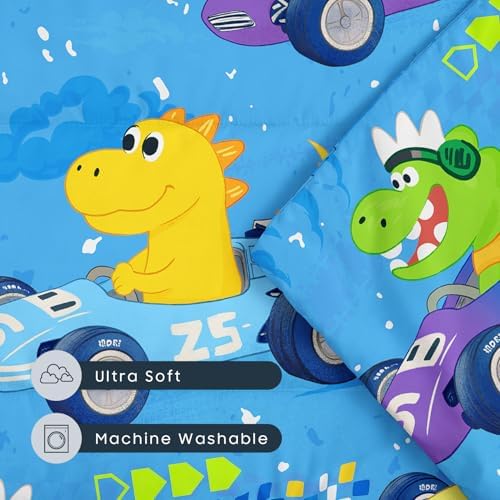 Wake In Cloud sky blue dinosaur bedding set laid flat on a kindergarten classroom floor.