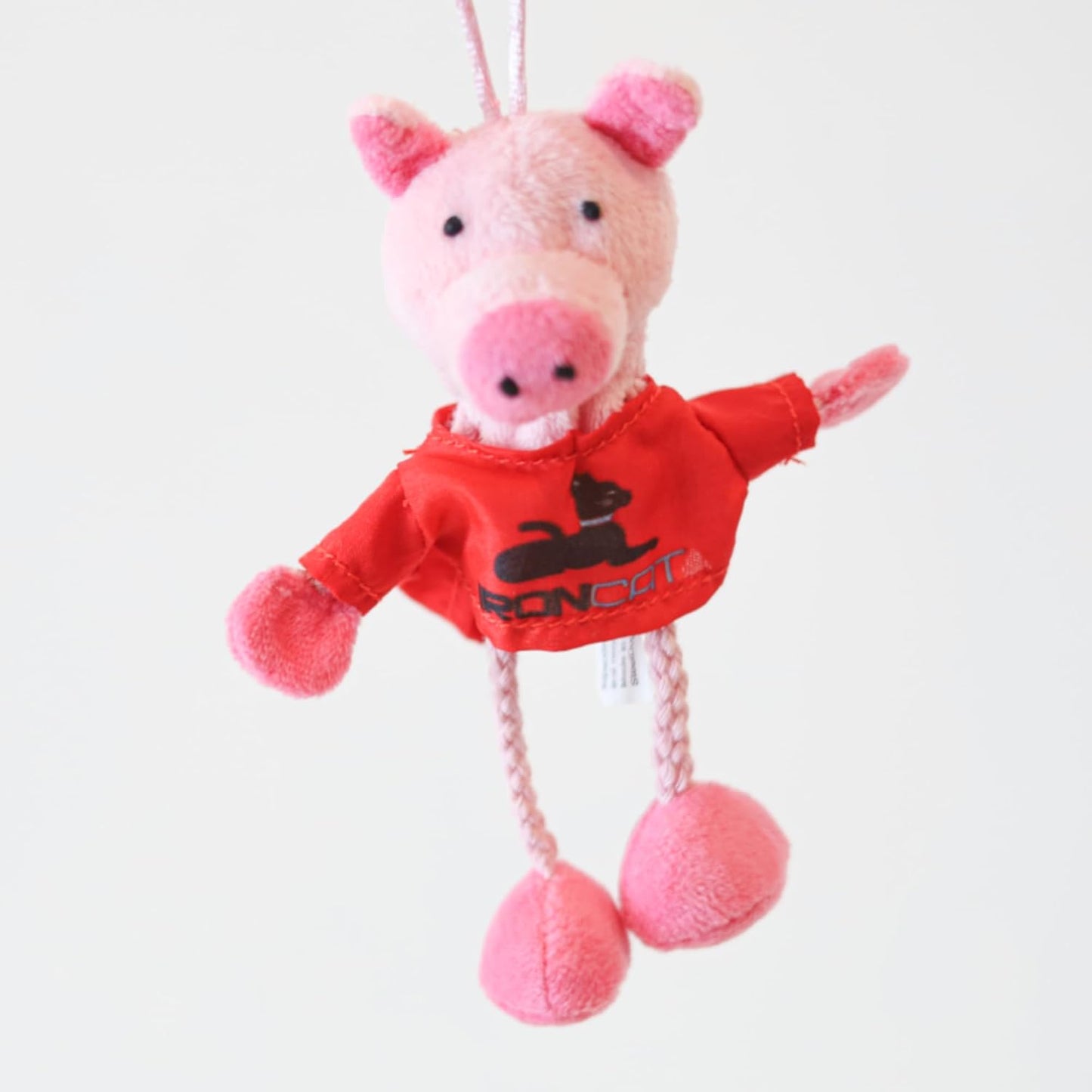 Steel Dog barnyard collection pig toy with long braided string legs