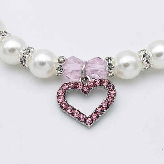 Close up of Petfavorites rhinestone and faux pearl pet collar