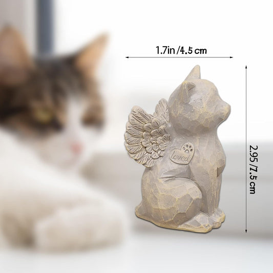 Hand painted cat angel statue close up showing angel wings and loved heart detail