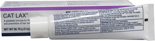 Dechra Cat Lax two ounce tube being squeezed for feline hairball prevention.
