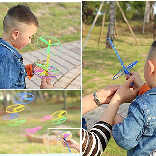 Demonstration view of the battery free pull string mechanism launching the colorful plastic flying disc