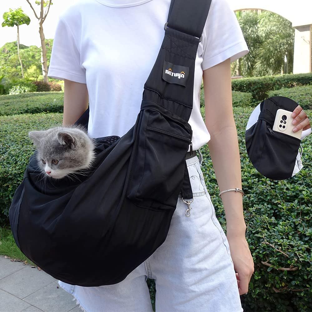 Natuya dog and cat sling carrier displayed for travel use