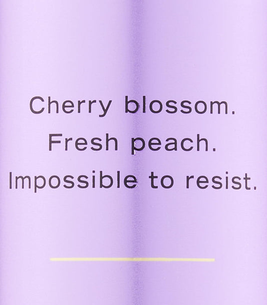 Victoria's Secret Love Spell refreshing body mist 250 ml packaging showing liquid detail.