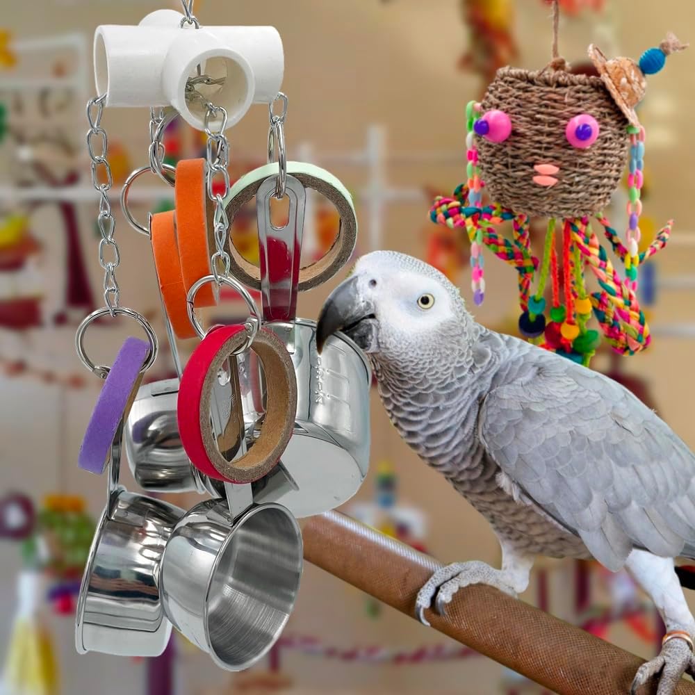 Full product view showing the four distinct sizes of stainless steel cups on the GILYGI toy.