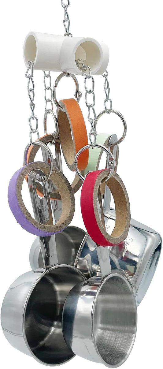Close up of pullable stainless steel measuring cups on the GILYGI bird toy.