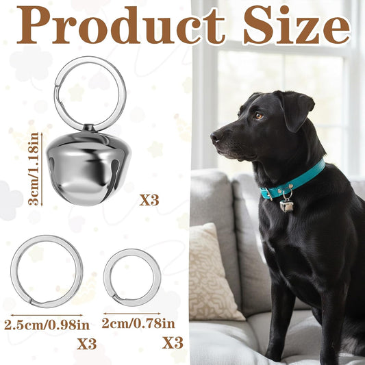 Three pieces of Qpets silver pet collar bells with cross shaped openings.