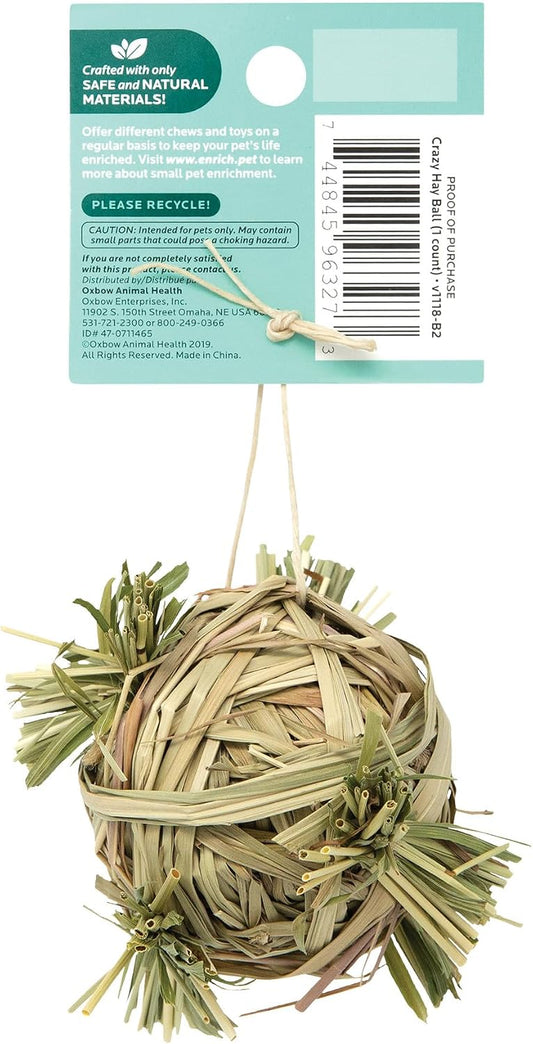 Oxbow premium Timothy hay chew ball inside a rabbit cage accessory setup