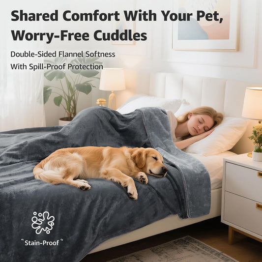 Reversible leakproof love blanket spread over a twin size bed mattress