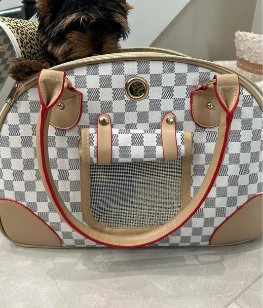 Side view of designer white and tan checkerboard pet carrier