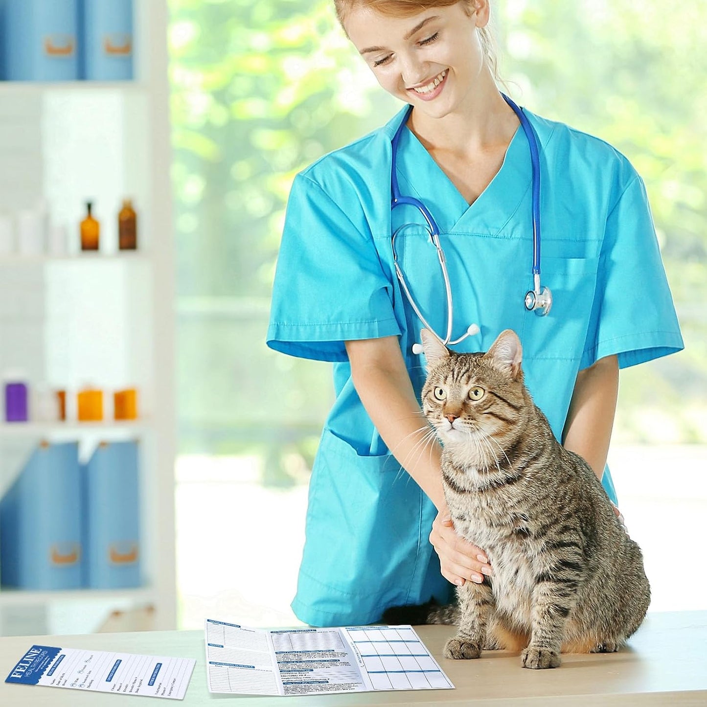 Dunzoom cat nursing supplies package showing multiple vaccine record books side by side.