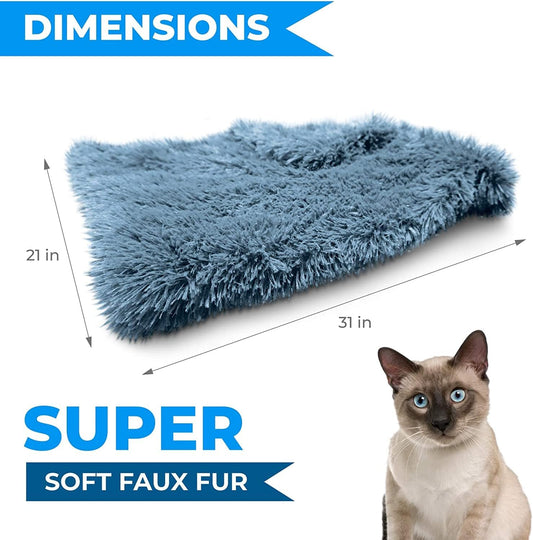 Cozy washable throw blanket for small dogs and indoor cats placed neatly on a living room sofa.