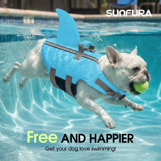 Adjustable dog swimming vest with high buoyancy shark fin design on a pet.