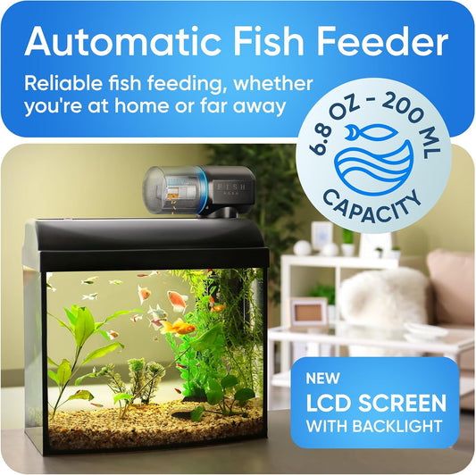 FISHNOSH programmable aquarium dispenser mounted on a small glass fish tank wall side profile